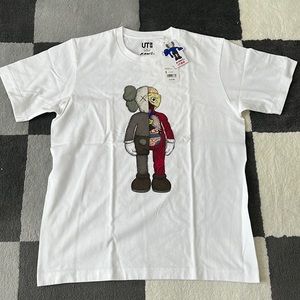 Kaws x Uniglo Men’s small tee. Brand new with tags